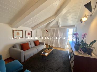 Modern attic apartment on the second and last floor of a tastefully renovated building about 1-1.2 km from the sea.